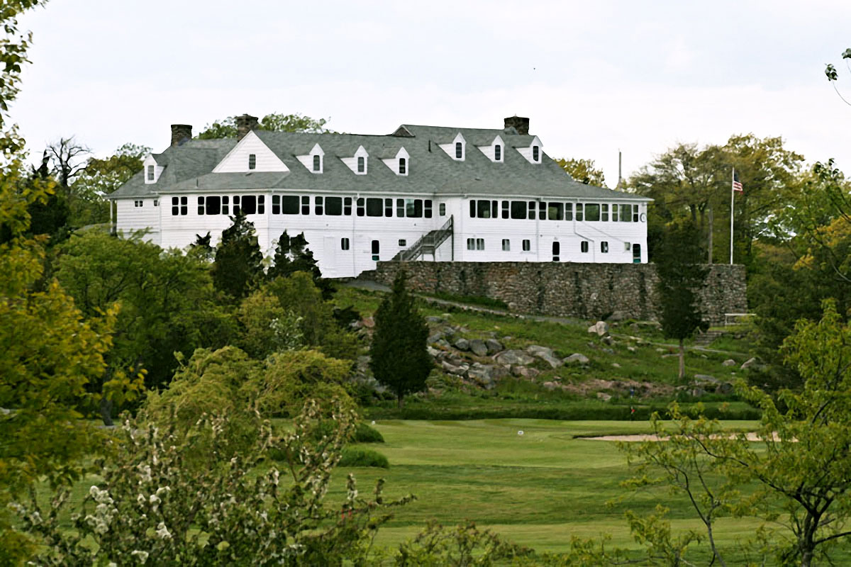The 1915 clubhouse above Sandy Bay